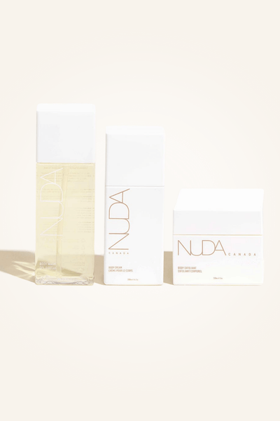 Body Essentials Trio set featuring tan remover, body wash, and moisturizer for sunless tanning.