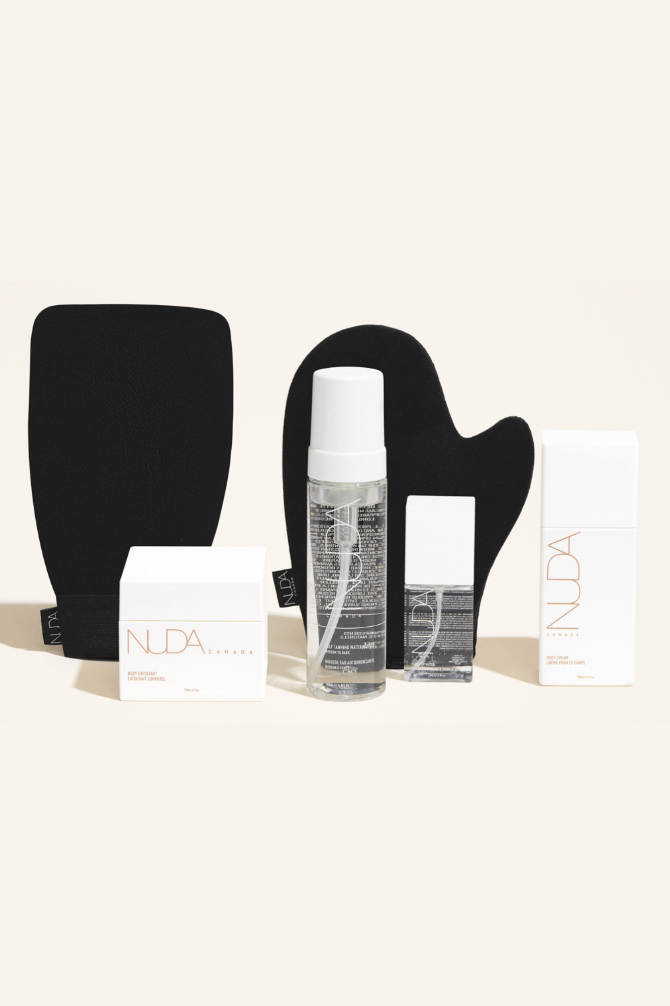 Deluxe Routine Kit featuring Self Tanning Mousse, Exfoliating Mitt, and Body Cream for a customizable tan.