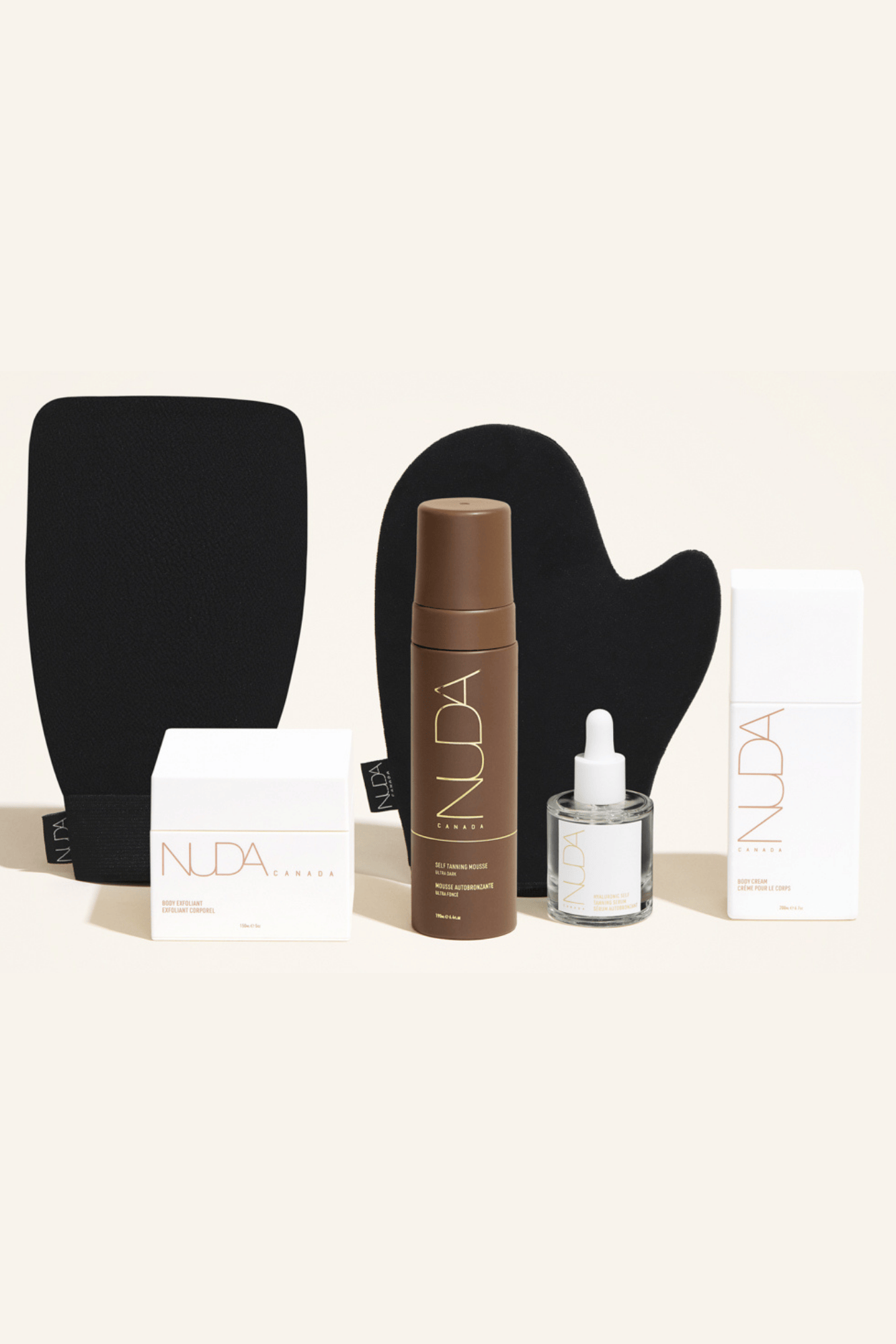 Deluxe Routine Kit with Body Exfoliant, Self Tanning Mousse, Tanning Mitt, and Body Cream for a customizable tan.