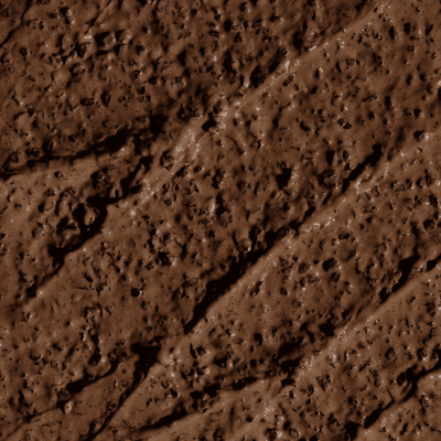 Creamy texture of a luxurious Body Exfoliant with Coffee Arabica, showcasing its rich, brown color and gentle, scrub-like appearance.