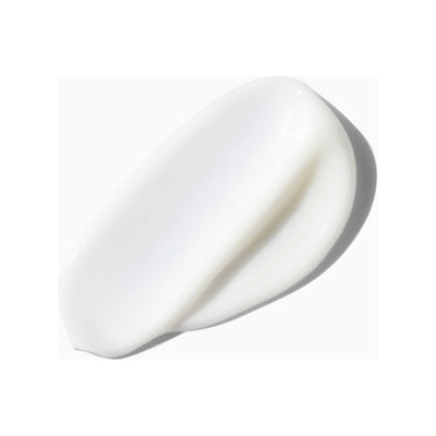 Creamy texture of Kérastase Nutritive Lait Vital Conditioner for ultra-light detangling and nourishment for dry hair.