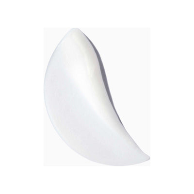 Nutritive Masquintense cream for very dry and fine hair in a smooth, crescent shape against a white background.