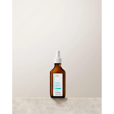 Moroccanoil Oily Scalp Treatment bottle on a light background for addressing excess oil and scalp concerns.