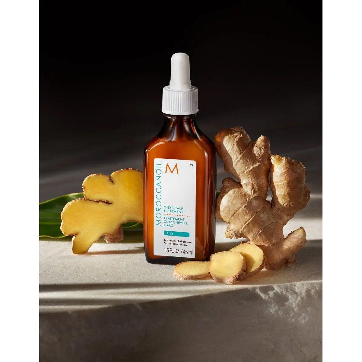 Moroccanoil Oily Scalp Treatment bottle with ginger root, designed to reduce excess oil and promote a clean scalp.