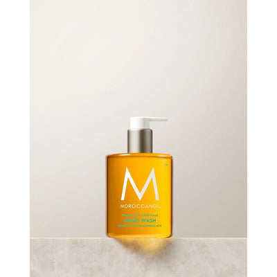 Originale Fragrance Hand Wash in a clear bottle featuring a pump, enriched with argan oil and hyaluronic acid.