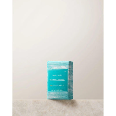 Moroccanoil Originale Fragrance Soap Bar on a light background, highlighting its gentle cleansing properties and hydration benefits.