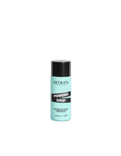 Redken Powder Grip texturizing hair powder for volume and grip, suitable for all hair types and textures.