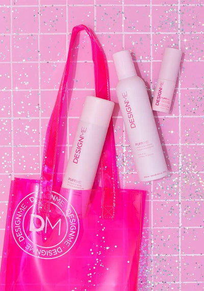 PUFF.ME Volume Glow & Go Kit in a pink tote bag, showcasing volumizing mousse and finishing products on a glittery background.