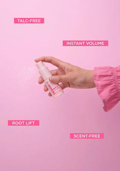 Hand holding PUFF.ME volumizing spray on pink background with labels: talc-free, instant volume, root lift, scent-free.