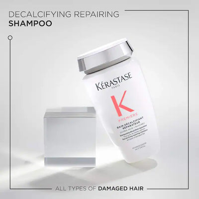 Kérastase Bain Décalcifiant Repairing Shampoo bottle for all types of damaged hair on a sleek background.
