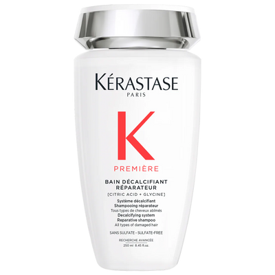 Kérastase Bain Décalcifiant Réparateur shampoo bottle for damaged hair, sulfate-free, 250ml size.