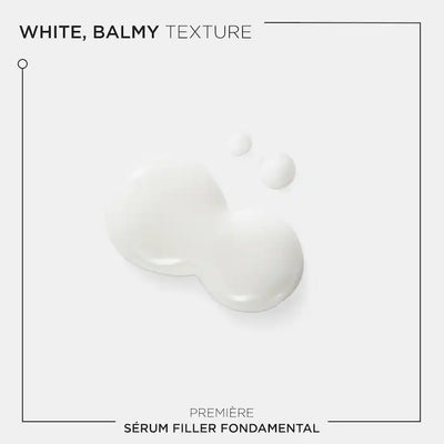 White balmy texture of Kérastase Sérum Filler Fondamental for damaged hair treatment.
