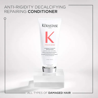Kérastase Fondant Fluidité Réparateur Conditioner for damaged hair, promoting elasticity and hydration.