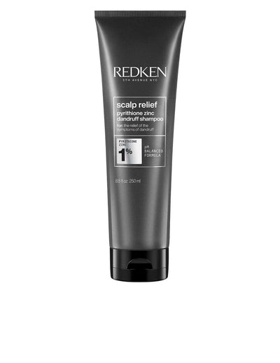 Redken Scalp Relief Dandruff Shampoo tube for effective dandruff treatment and scalp soothing, suitable for all hair types.