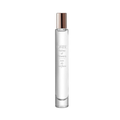 Oribe Valley of Flowers Eau De Parfum travel size bottle showcasing a floral fragrance with notes of rose, jasmine, and amber.