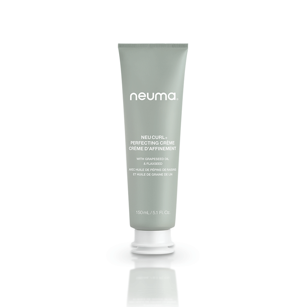 Neu Curl Perfecting Crème tube for enhancing curls, providing frizz control and moisture with a coconut hibiscus aroma.