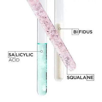Test tubes showcasing Salicylic Acid, BiFidus, and Squalane ingredients for effective skincare solutions.