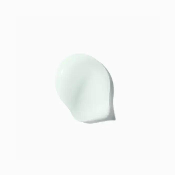 Moisturizing cream dollop on white background, skincare product, hydrating face cream.