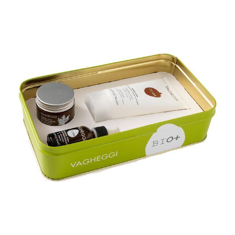 Vagheggi Bio+ skincare set in a green tin, featuring moisturizer and natural extracts for hydration and protection.