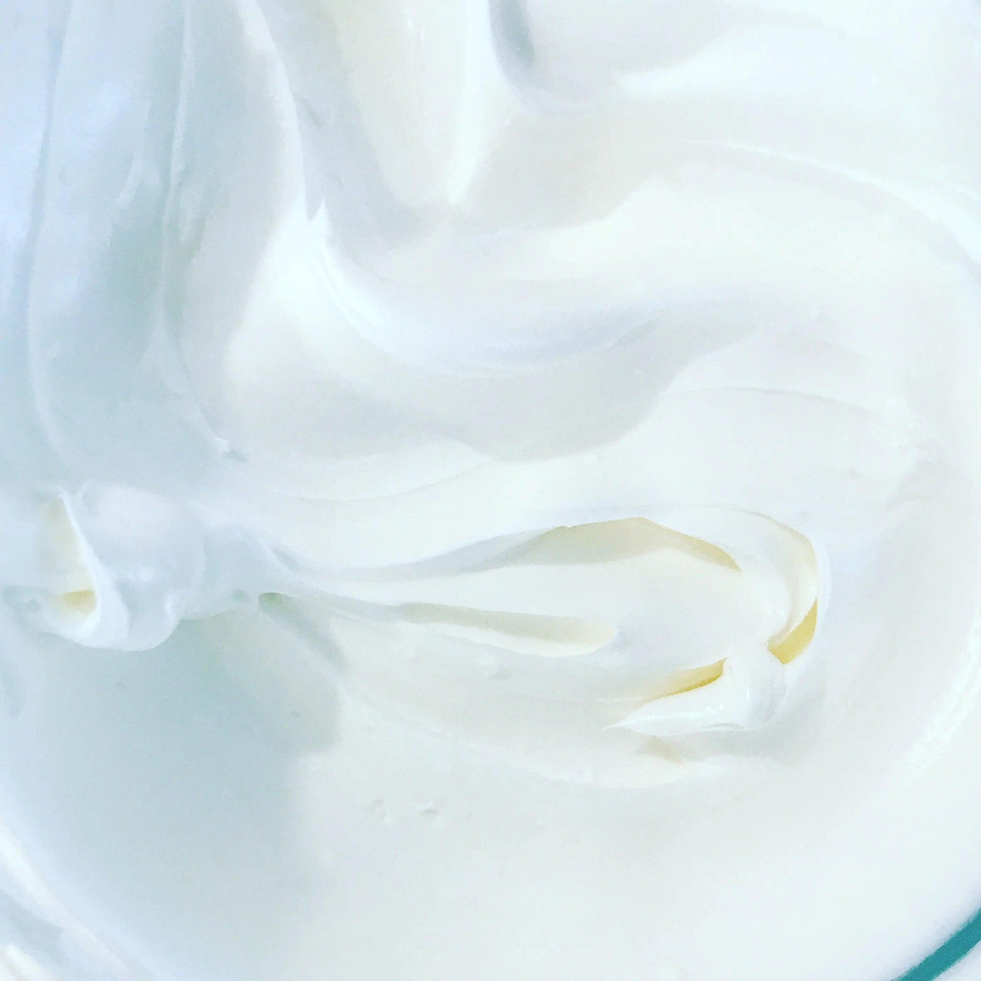 creamy texture of Butter Me Up whipped body butter with a smooth, fluffy consistency ideal for hydration and skin softness.