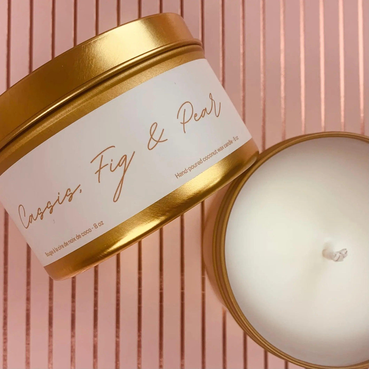 Cassis, Fig & Pear 8 oz candle in reusable gold tin with white wax, perfect for home ambiance.
