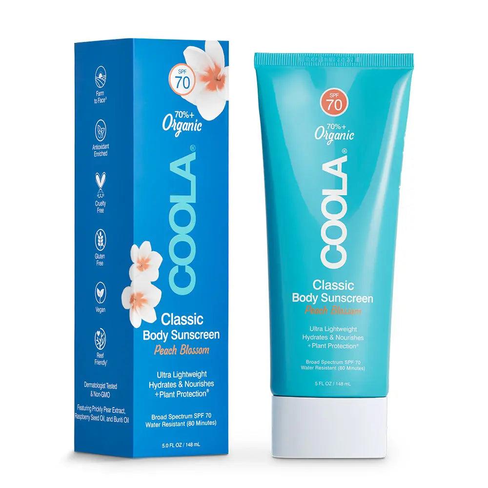 Classic Body Sunscreen Peach Blossom 148ml by Coola, featuring organic protection and lightweight hydration for sun safety.