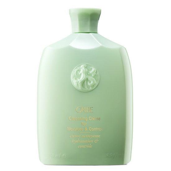 Oribe Cleansing Creme for Moisture Control in green bottle, luxury hair care product for hydration and control