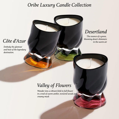 Oribe Luxury Candle Collection featuring Côte d'Azur, Desertland, and Valley of Flowers in stylish black holders.