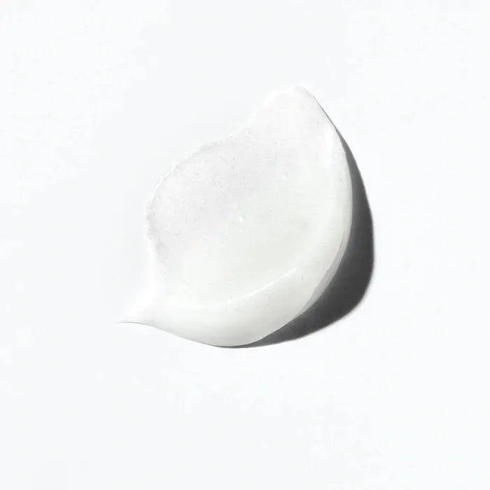 Curl Manifesto nourishing hair mask cream on a white background for intense moisture and shine.