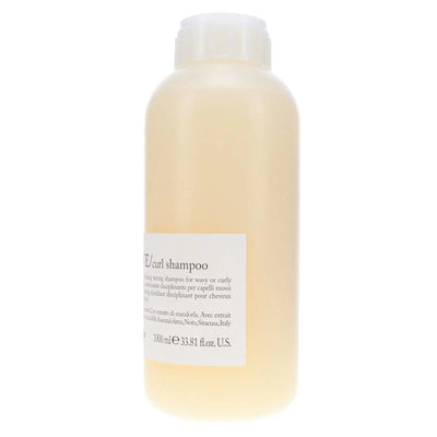 Davines Love Curl Shampoo 1L bottle, moisturizing creamy formula for enhancing wavy and curly hair texture and volume.
