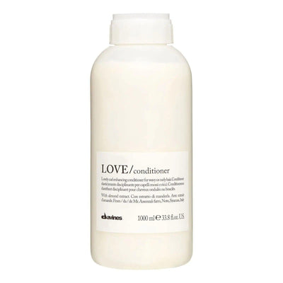 Davines Love Conditioner 1L for curly hair, enhancing softness, volume, and shine while moisturizing and defining curls.