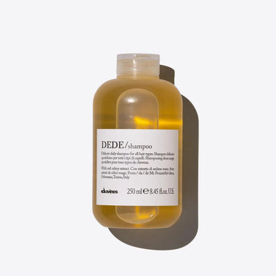Davines DEDE shampoo bottle for daily use, 250ml, suitable for all hair types, moisturizing and delicate cleansing formula on a white background
