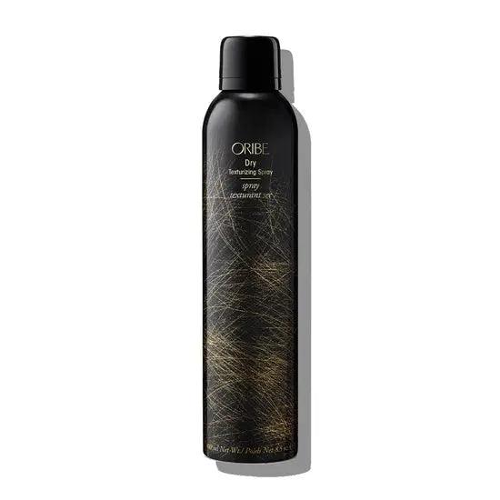Oribe Dry Texturizing Spray black bottle for hair volume and texture styling.