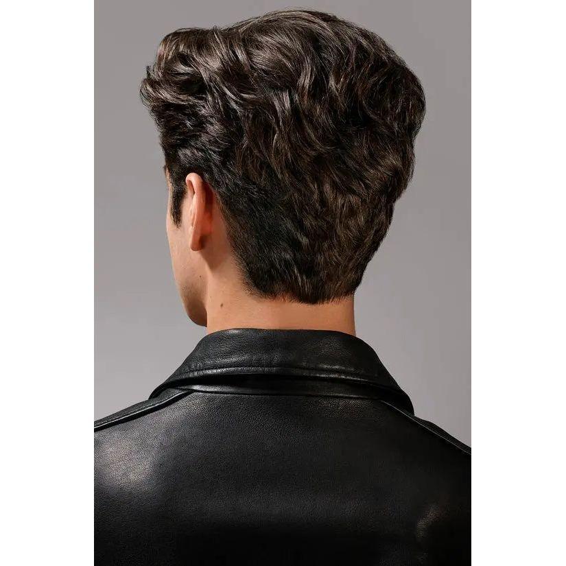 Man with stylish wavy hairstyle wearing a black leather jacket, rear view