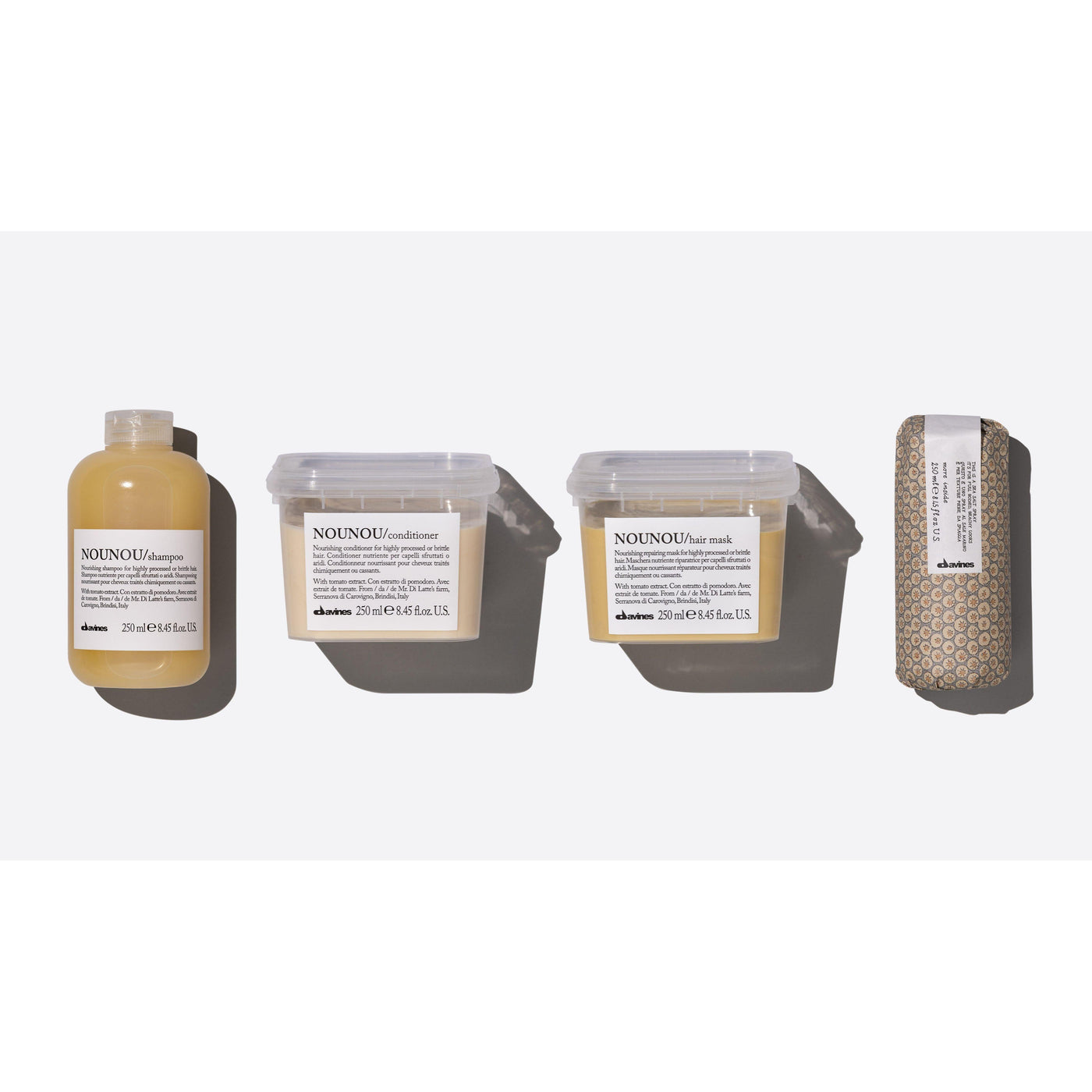 Davines Easy Beach Waves Set with Nounou Shampoo, Conditioner, Hair Mask, and Sea Salt Spray for effortless beachy waves.