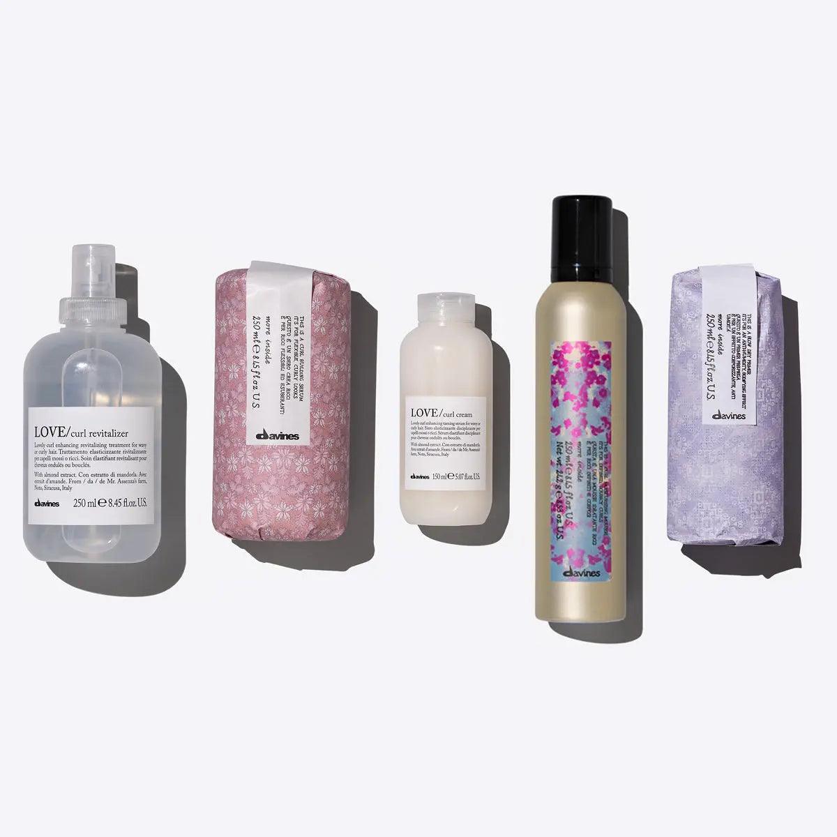 Davines Everyday Curls Set featuring five products for bouncy curls, including revitalizer, serum, cream, primer, and mousse.