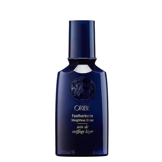 Oribe Featherbalm Weightless Styler hair product in dark blue bottle for lightweight styling 100ml
