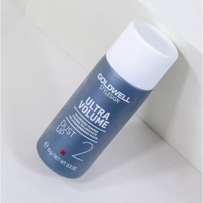 Goldwell Stylesign Ultra Volume Dust Up Volumizing Powder bottle for flexible volume and texture in hair styling.