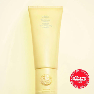 Oribe Hair Alchemy Resilience Conditioner tube, award-winning hair therapy for strength and hydration.