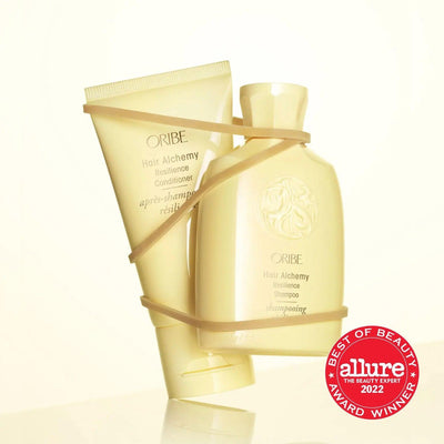 Oribe Hair Alchemy Resilience Shampoo and Conditioner, best of beauty award winner in 2022, featured in elegant packaging.