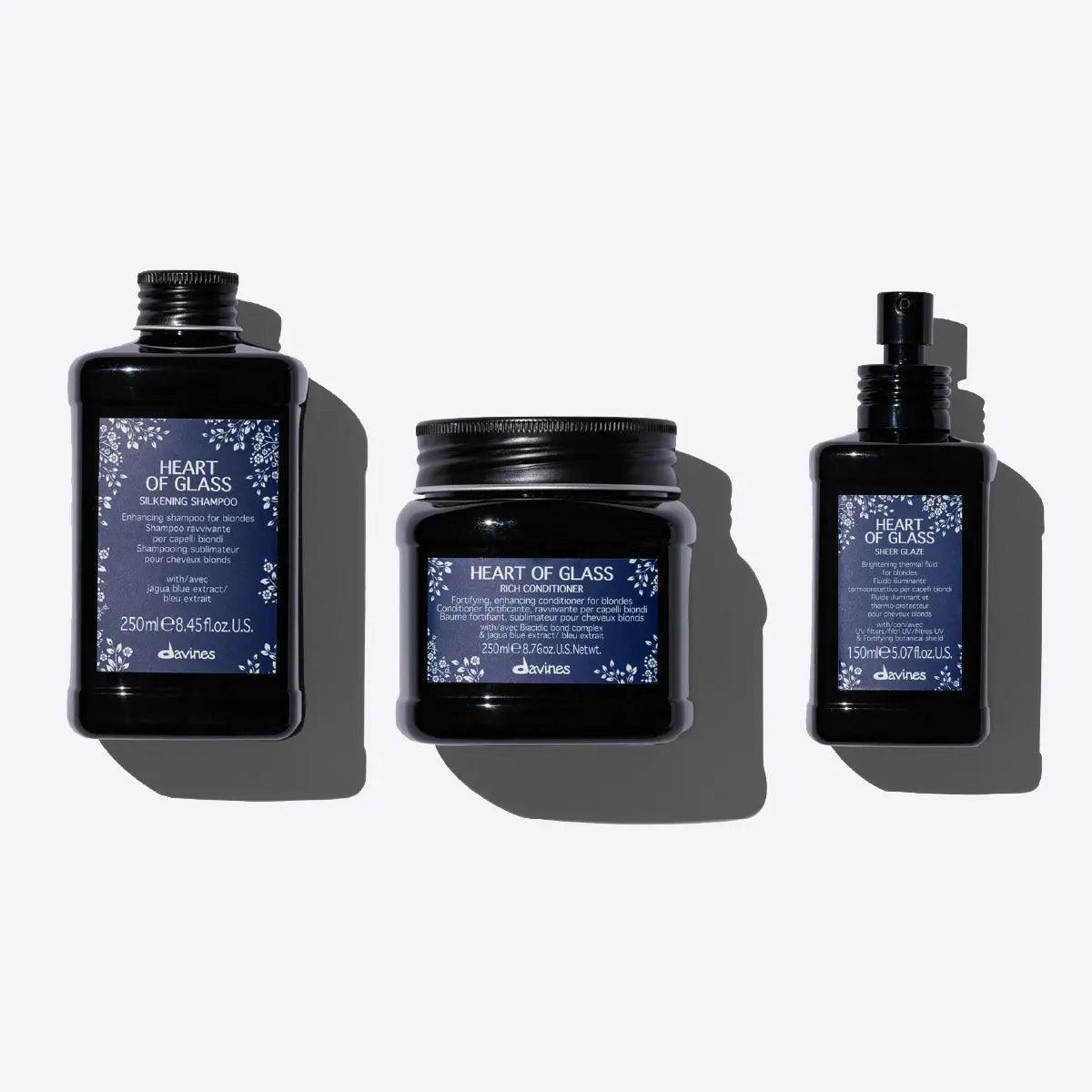 Davines Heart of Glass hair care set including shampoo, conditioner, and glaze for silky and radiant hair.
