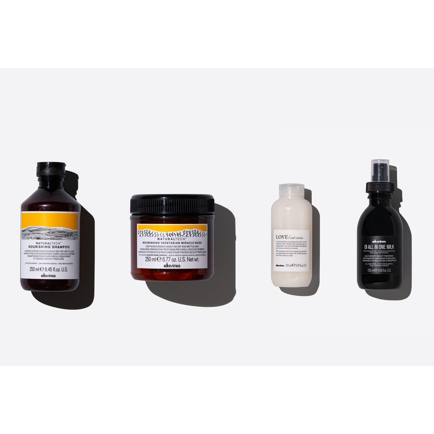 Davines Heatless Natural Waves Set featuring nourishing shampoo, miracle mask, curl cream, and all-in-one milk.
