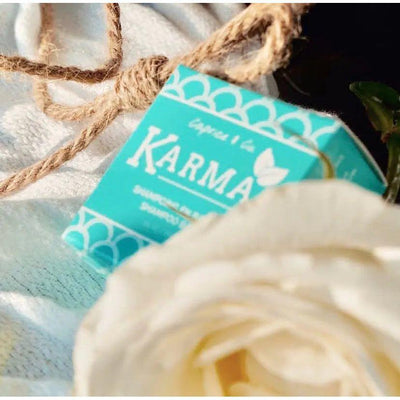 Karma shampoo bar packaging with rose, showcasing organic, zero-waste hair care solution handmade in Quebec.