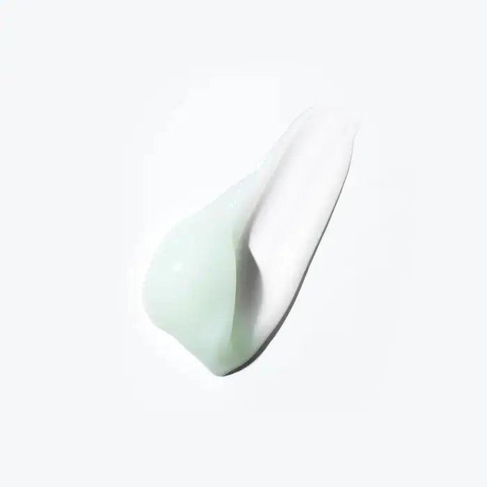 Kérastase Spécifique Masque Réhydratant hair mask swatch showing creamy texture for hydration and scalp nourishment.
