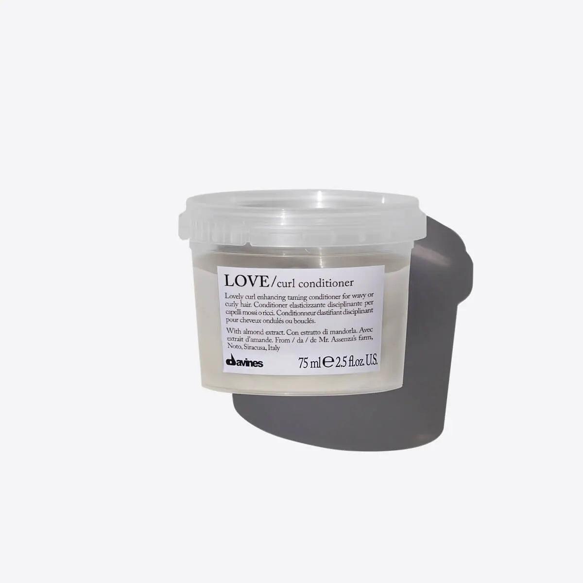 Davines LOVE curl conditioner for curly hair, 75 ml. This nourishing conditioner enhances curls and controls frizz for soft, defined locks.