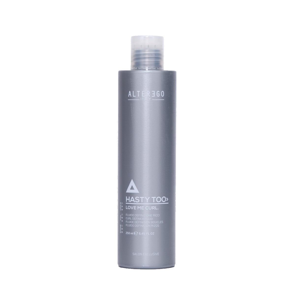 Hasty Too Love Me Curl modeling fluid for soft curl definition and long-lasting hold in a sleek silver bottle.