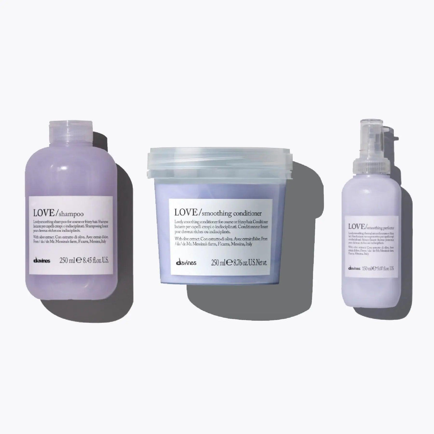 Davines Love Smoothing Essentials Set featuring shampoo, conditioner, and smoothing perfector for frizz control.