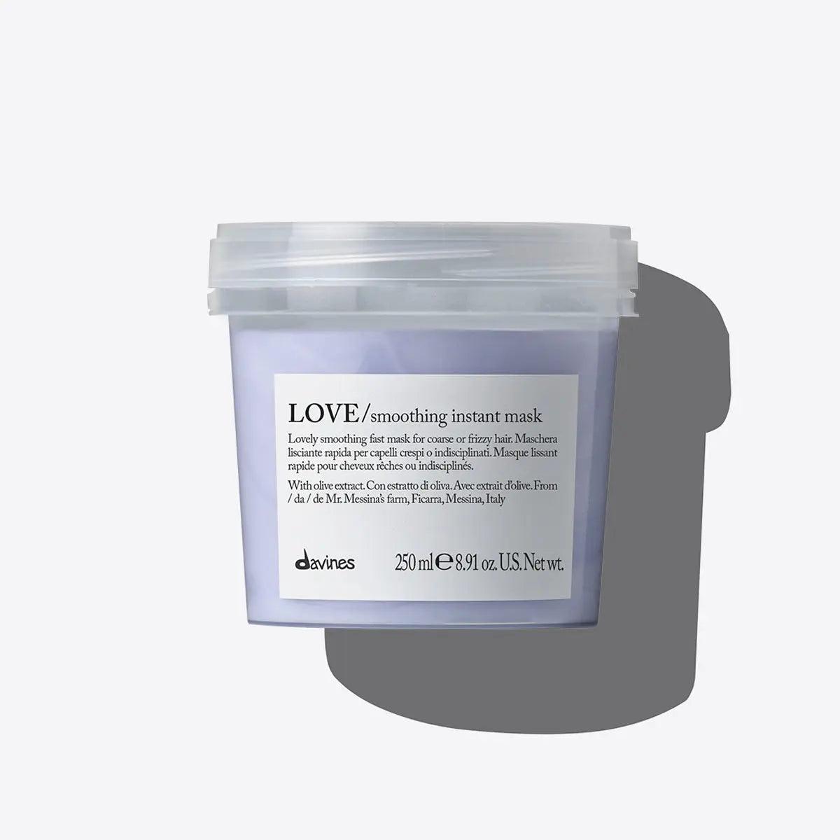 Davines Love Smoothing Instant Mask container with luxurious hair treatment for hydration and frizz control.