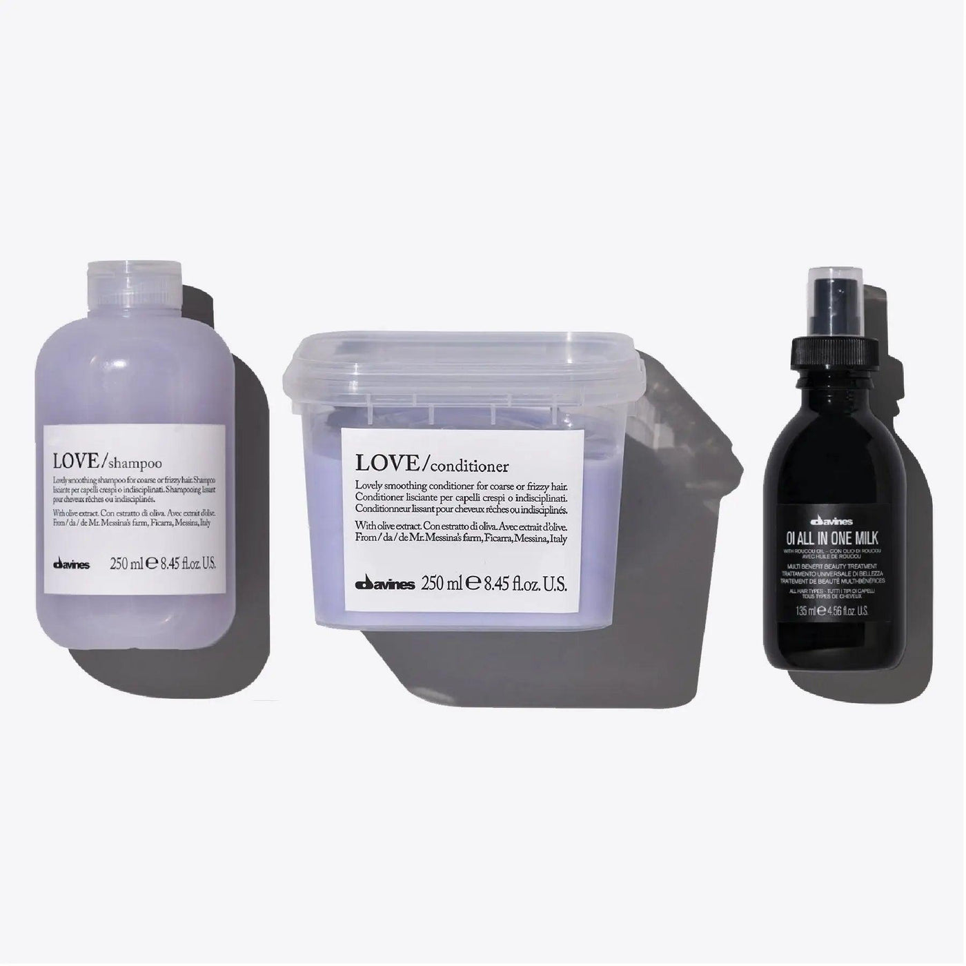 Davines Love Smoothing + Oi Set featuring Love Shampoo, Love Conditioner, and Oi All In One Milk for nourishing hair.