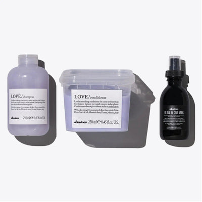 Davines Love Smoothing + Oi Set featuring Love Shampoo, Love Conditioner, and Oi All In One Milk for nourishing hair.